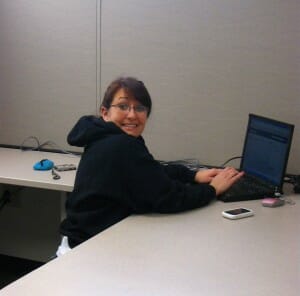 Cailey at her desk
