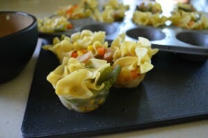 Chicken noodle soup place into individual sections of a muffin tin, then frozen.