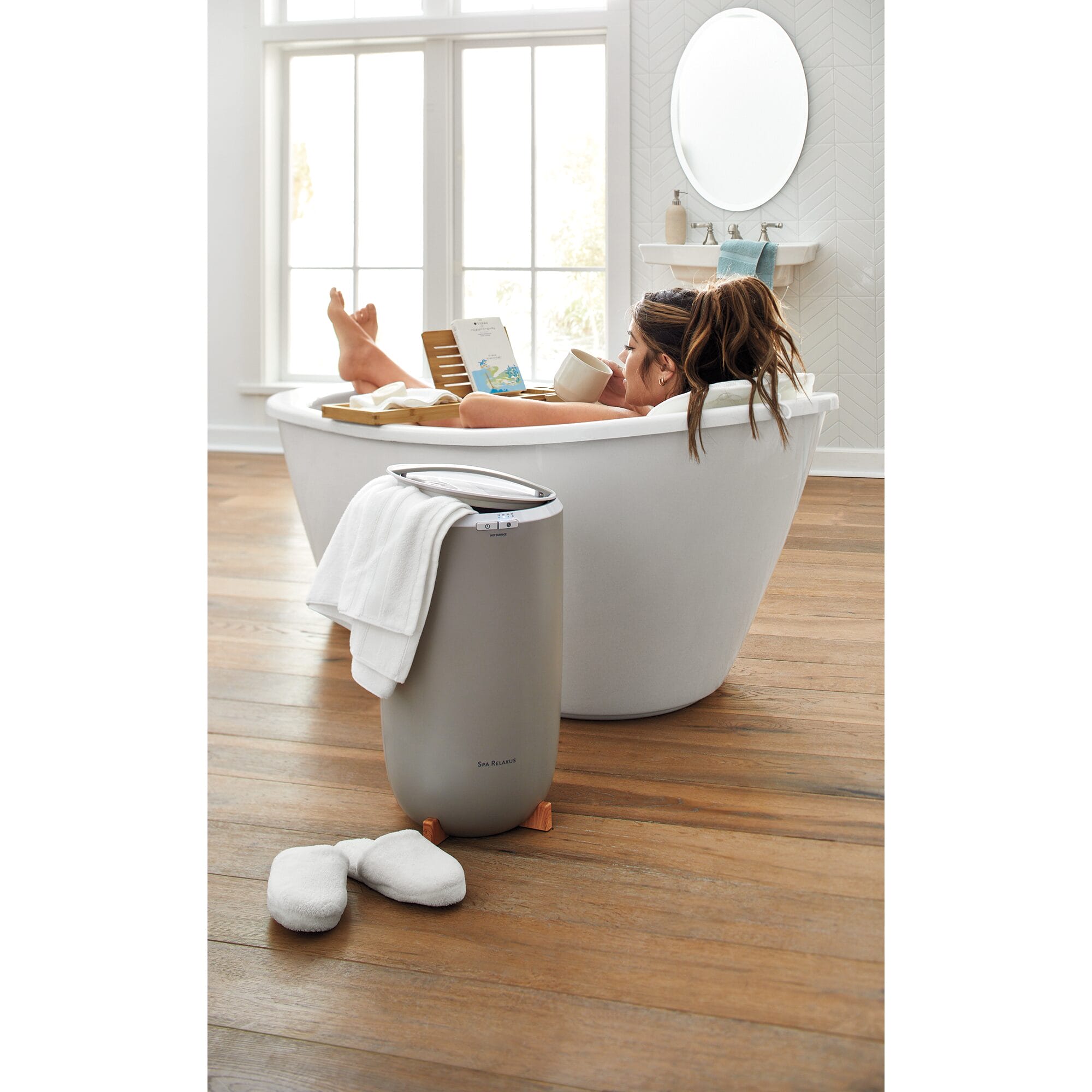 Woman in Bath sipping Tea