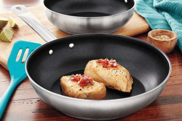 Chicken Being Pan Fried in Deep Skillet