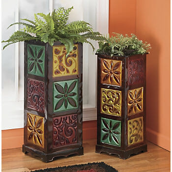 Two sizes of tall planters with embossed squares in gold, red, green and orange.