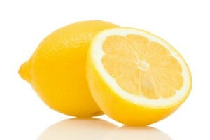 Two halves of a cut lemon.