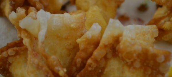 Close-up of fried Crab Rangoons.