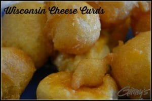 Wisconsin Cheese Curds - A bright blue plate with fried Wisconsin Cheese Curds.